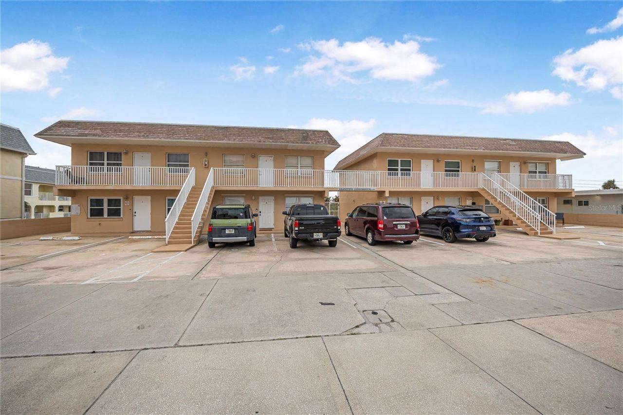 Photo 2 of 20: Front building - unit 20 is 1st floor in the left building