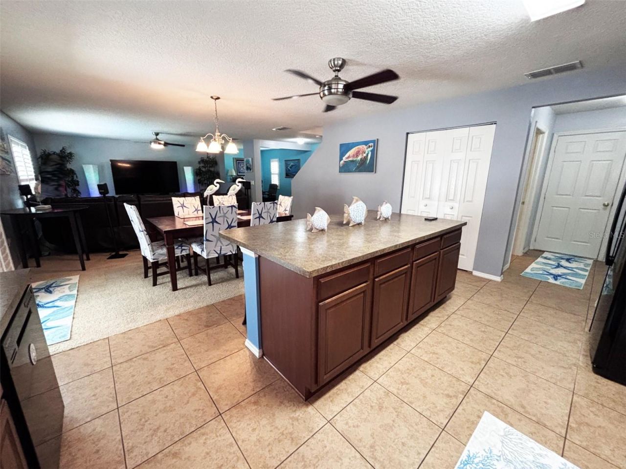 Photo 7 of 20: Island, dining room, living room