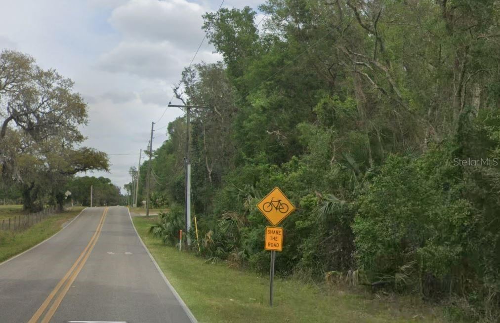Photo 4 of 7: Power lines right along the front of the property