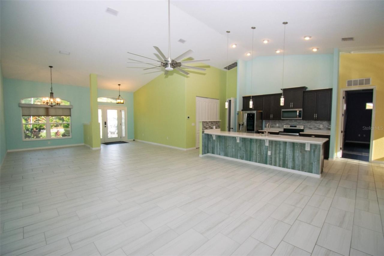 Photo 5 of 20: The Kitchen overlooks the family living room, so you never miss any of the action.