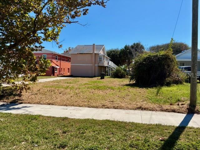 Photo 1 of 6: Lot has been cleared, driveway to the left of the photo
