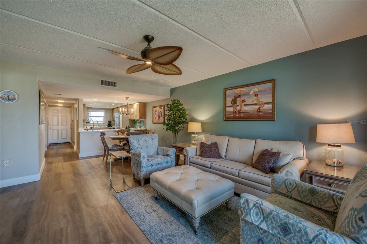 Photo 13 of 20: Wide view showcasing the open flow from the living room into the dining area and kitchen, ideal for everyday living.