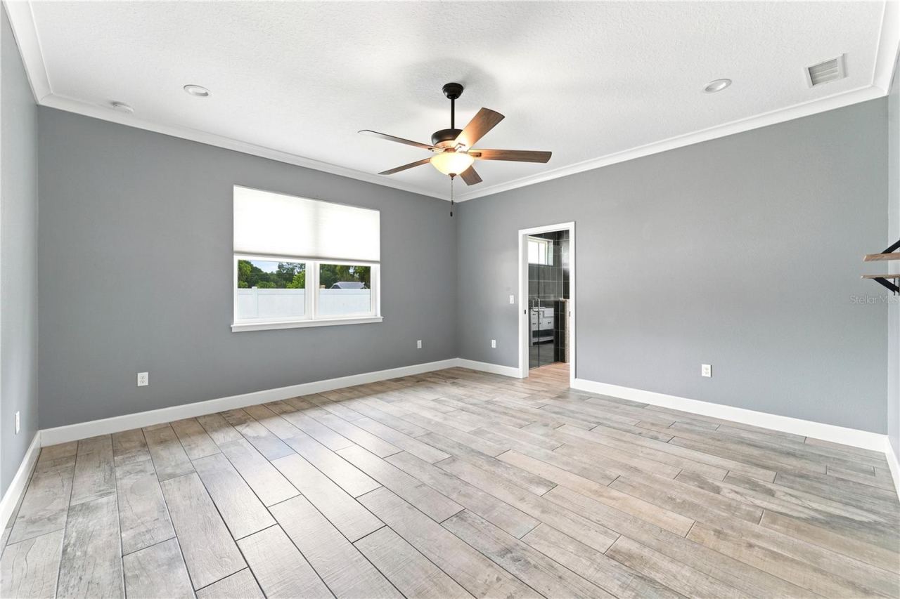 Photo 10 of 20: Primary Bedroom- 15.3 length x 15.5 width- all measurements must be verified.