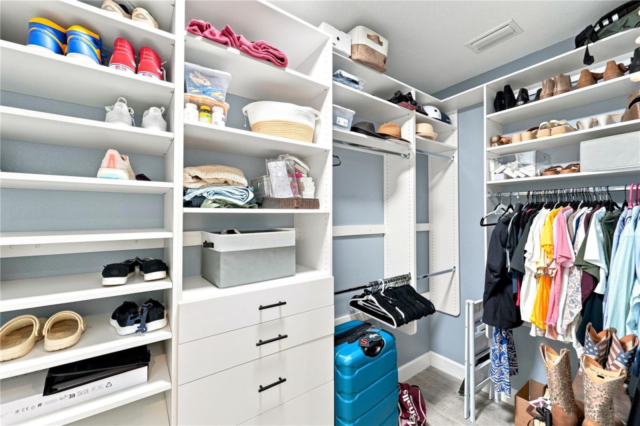 Photo 12 of 20: Primary Walk In Closet system.