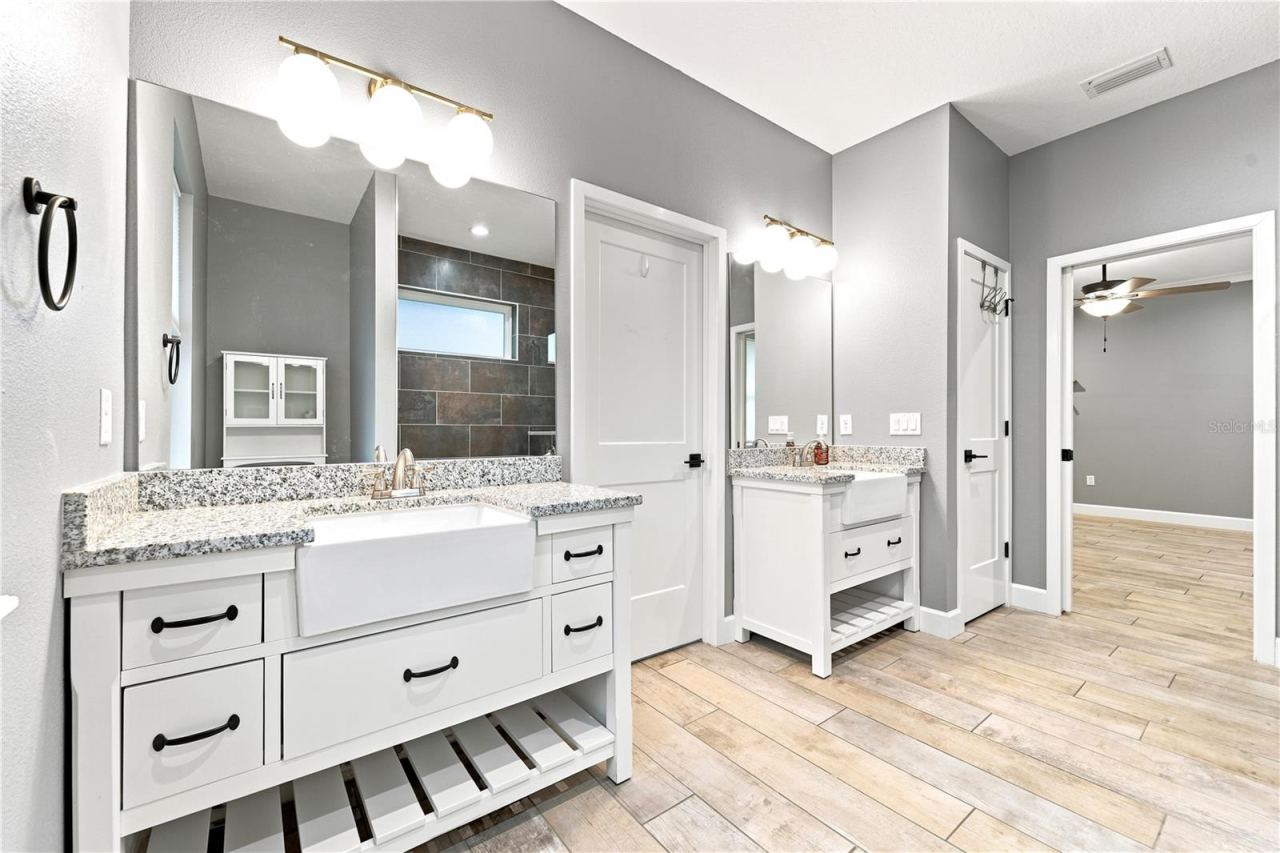 Photo 9 of 20: Double Split Vanities in primary bathroom