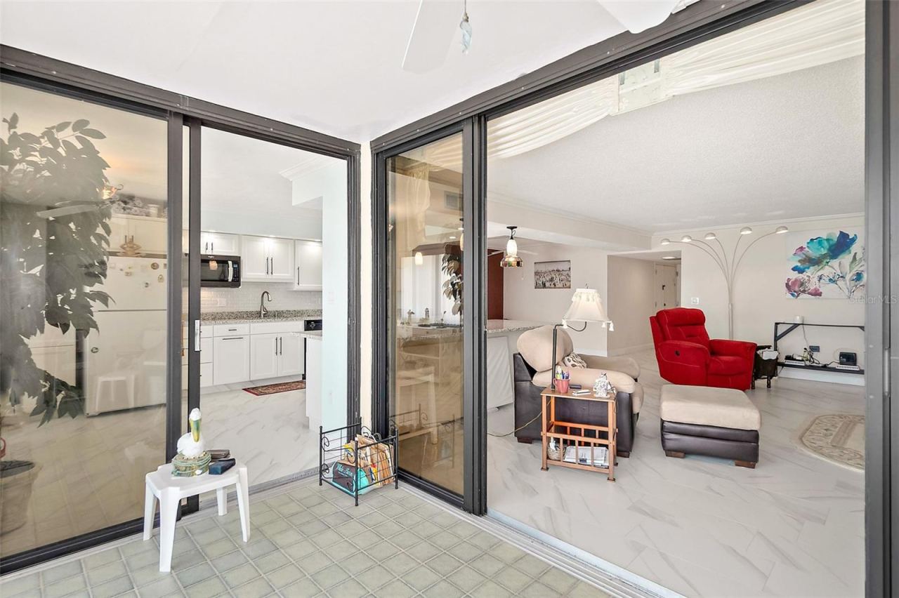 Photo 19 of 20: Double balcony doors from the kitchen and living room