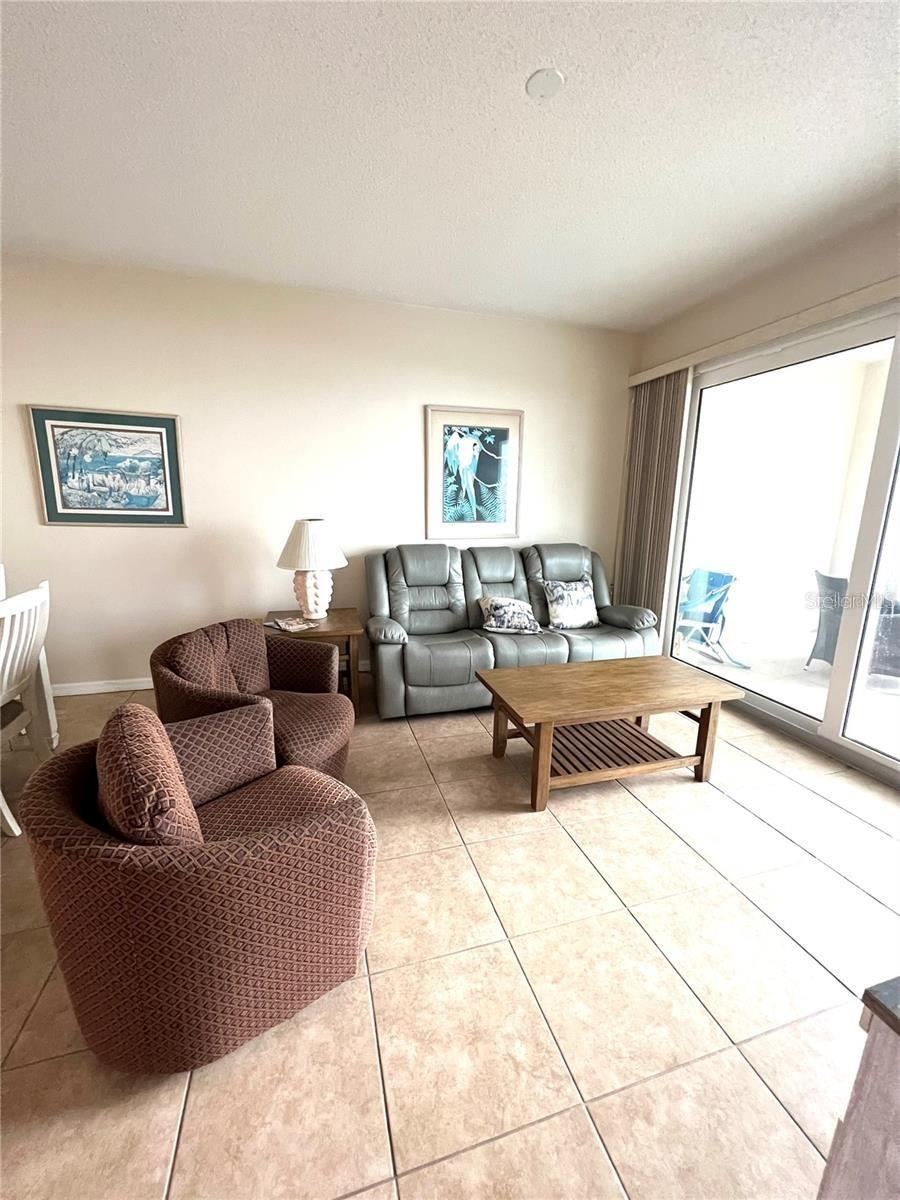 Photo 10 of 20: Living room area- SLiders to Baclony