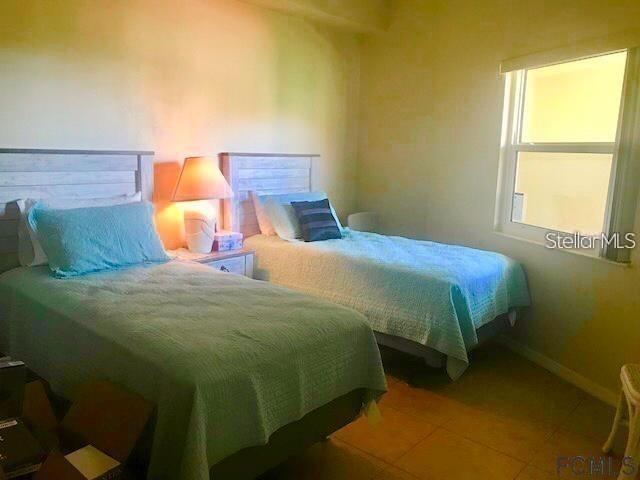 Photo 20 of 20: Second bedroom with twin beds and large window