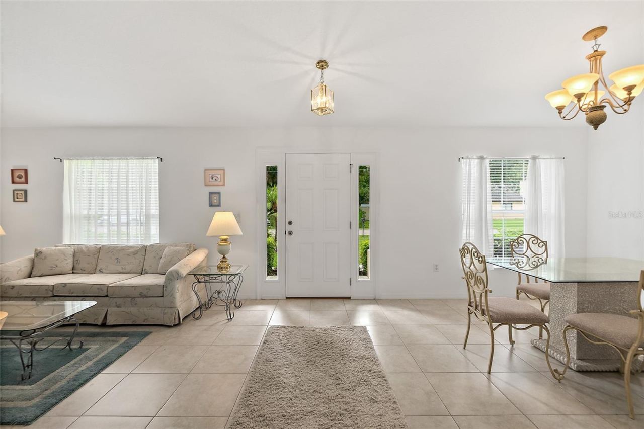 Photo 3 of 20: Front Entrance with Living and Dining Rooms.