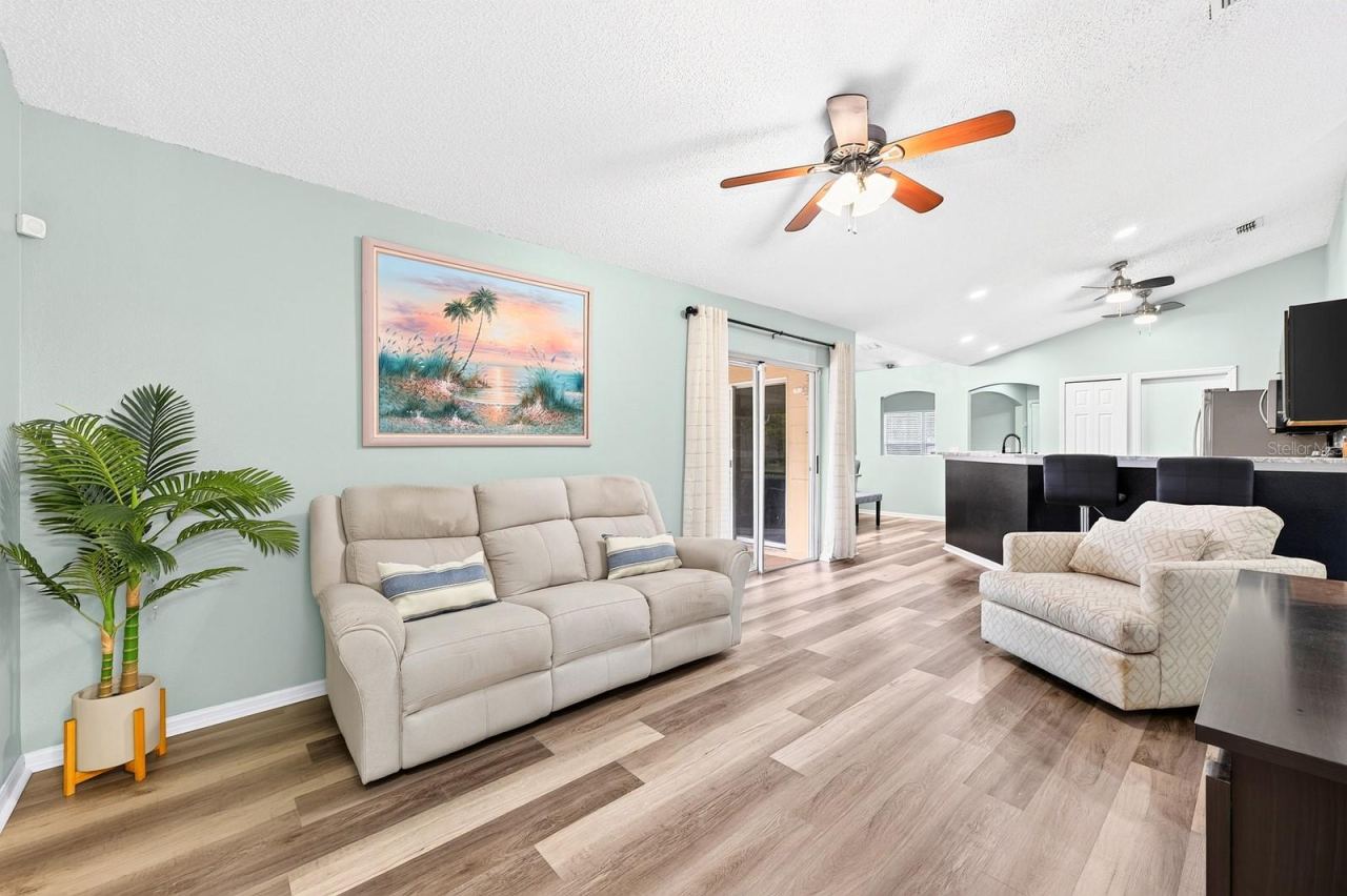 Photo 9 of 20: Family room is open to the kitchen.