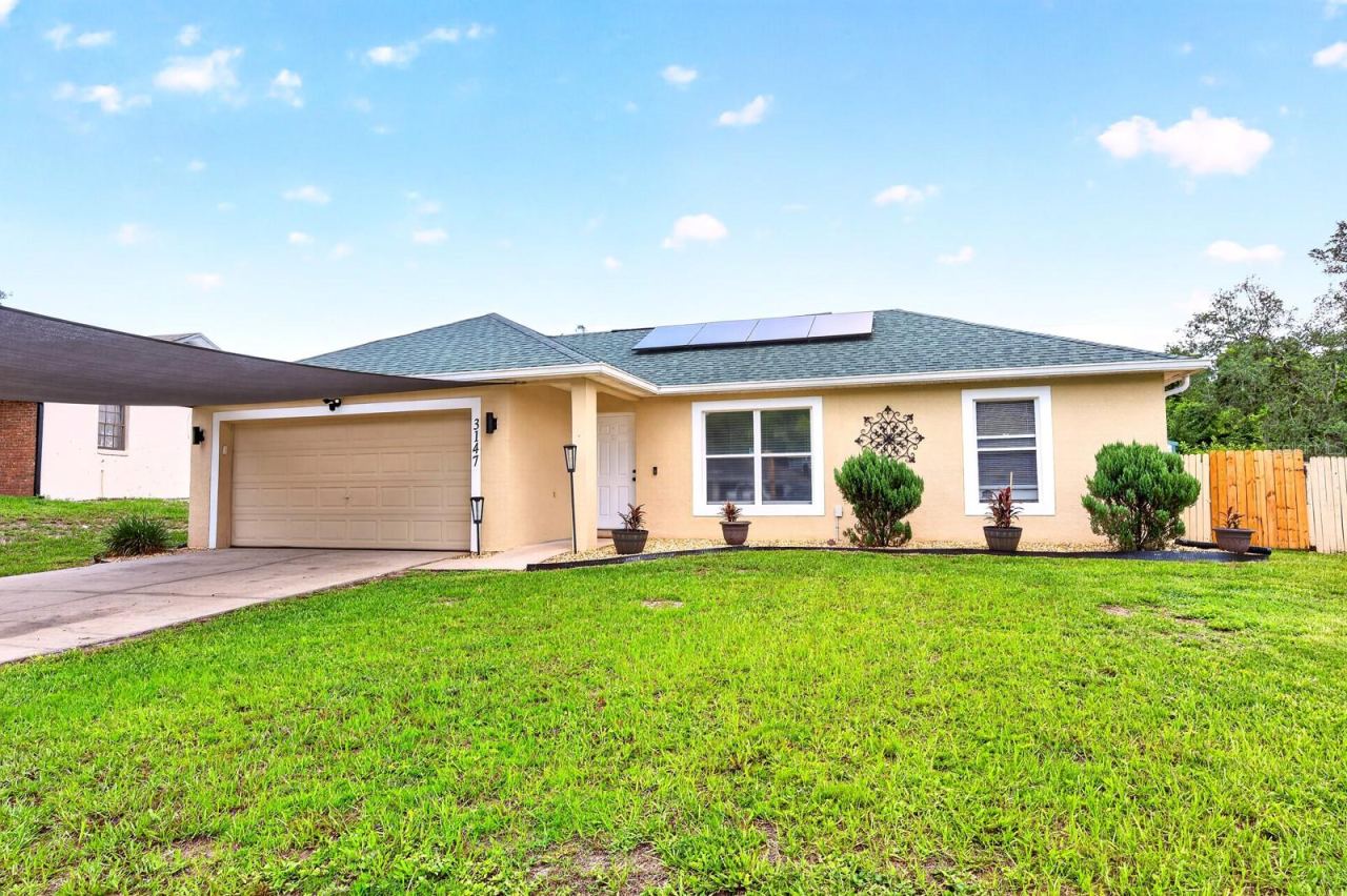 Photo 1 of 20: Fresh updates, energy-saving features, and NO HOA make this well maintained 4-bedroom, 2-bath block home on a spacious .24 ACRE LOT an opportunity you won't want to miss!