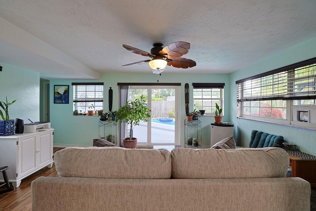 Photo 19 of 20: Florida Room into Backyard Pool Area