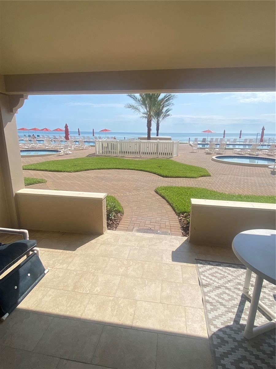 Photo 1 of 20: Living Area Porch View Overlooks Ocean, Pools