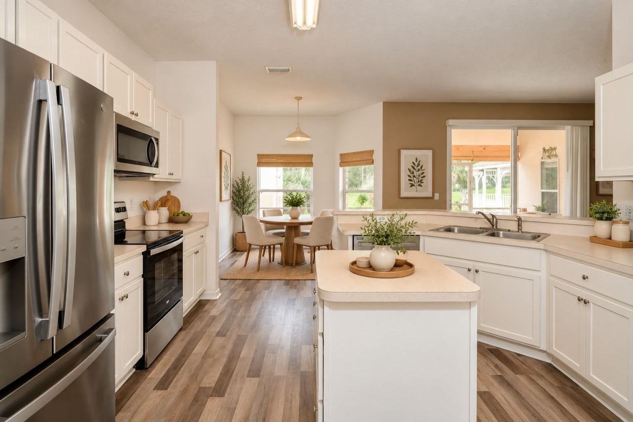 Photo 15 of 20: Virtually Staged Kitchen overlooking Breakfast Nook