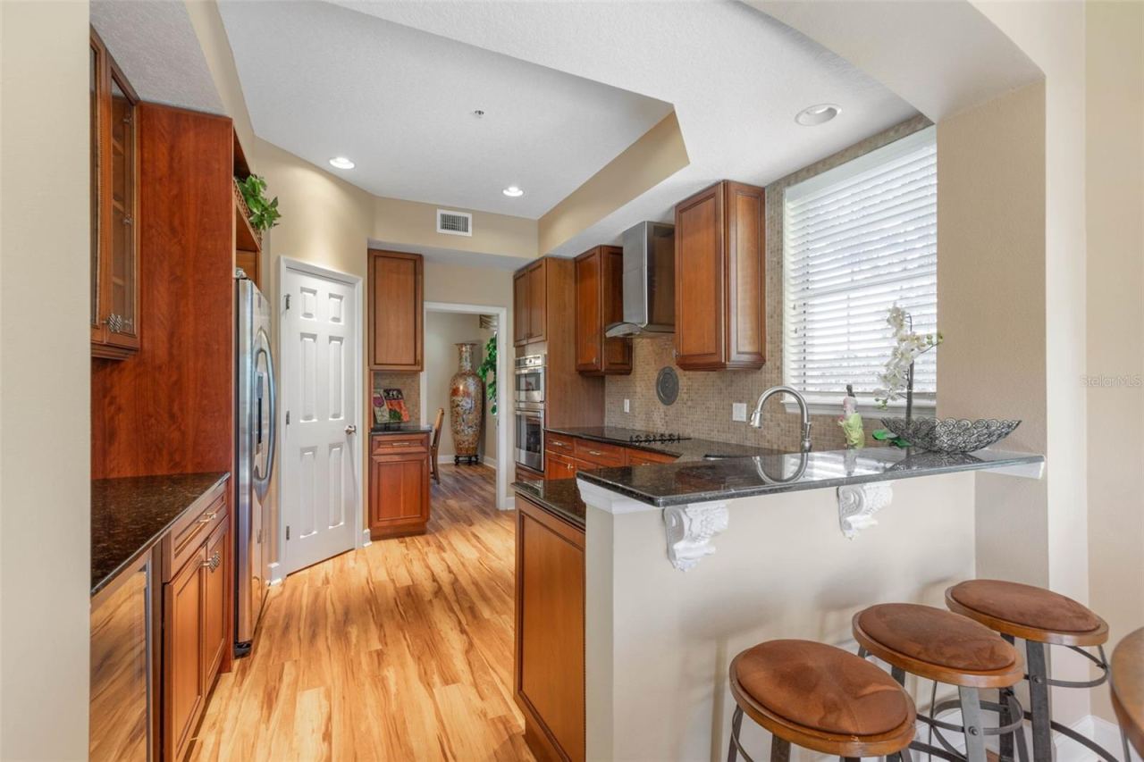 Photo 6 of 20: 42 inch cabinets, pantry, stainless appliances and plenty of light