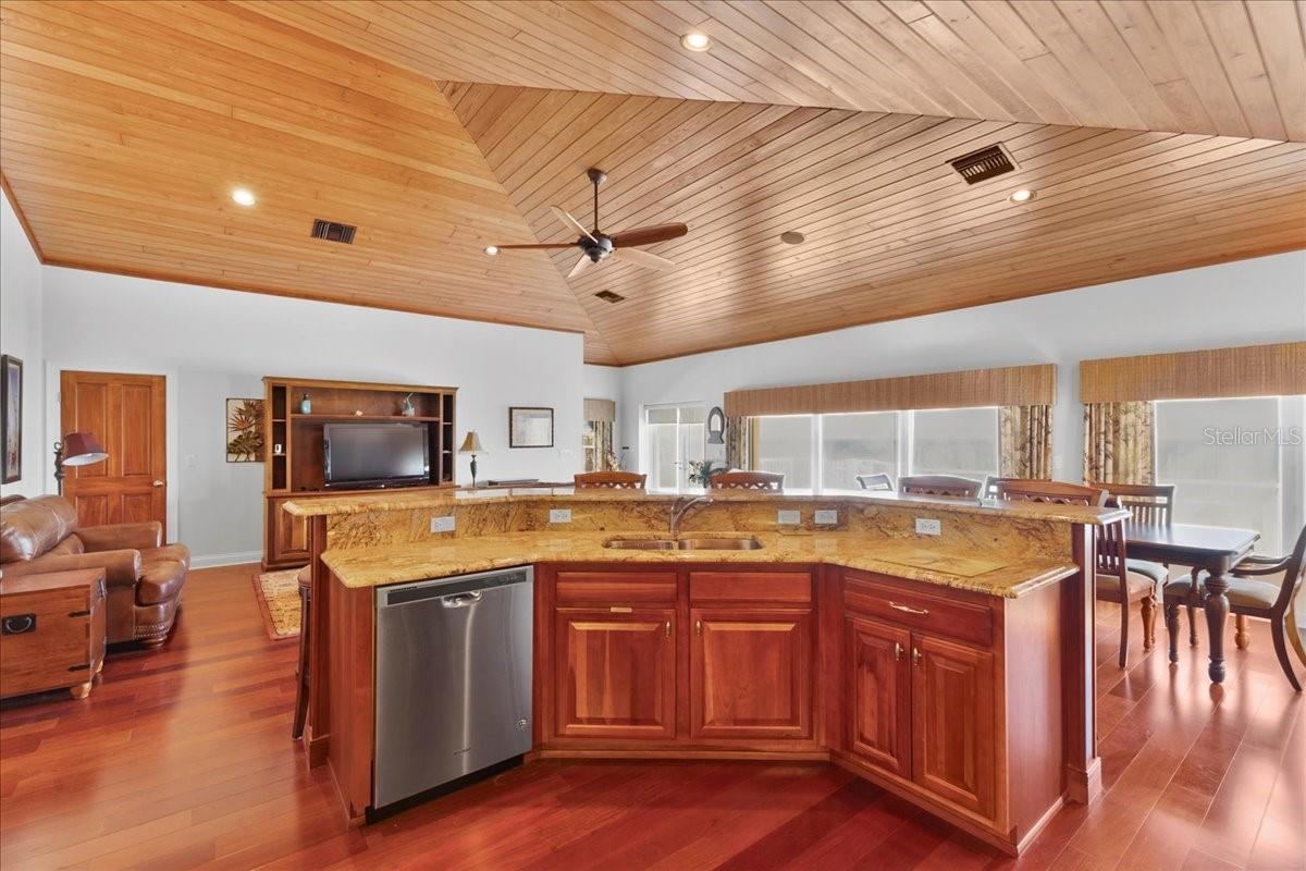 Photo 17 of 20: Second floor living room, kitchen and dining area. Facing ocean.