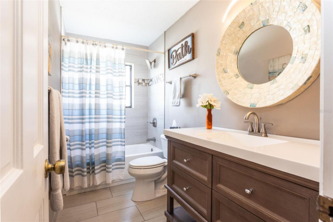 Photo 20 of 20: Guest Bathroom with a tub.