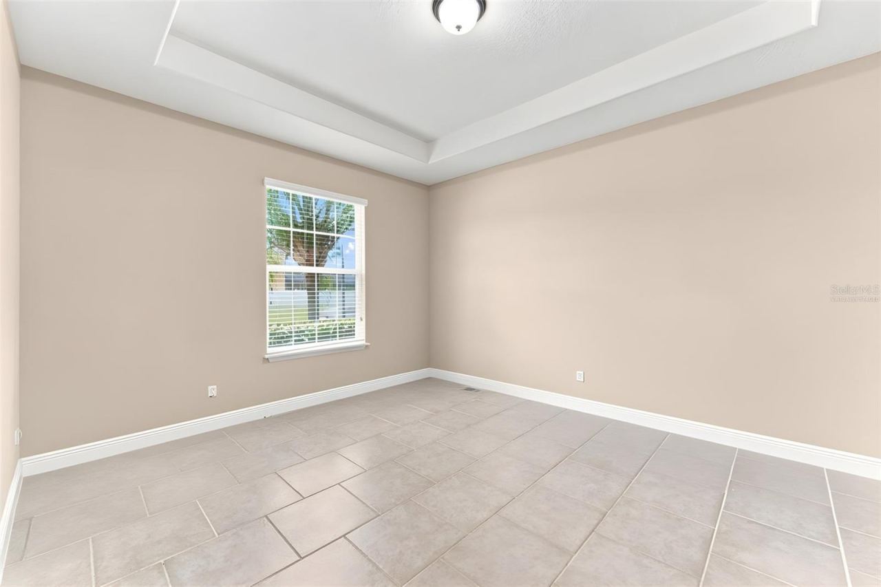 Photo 17 of 20: Virtually altered den/bonus room with tray ceiling.