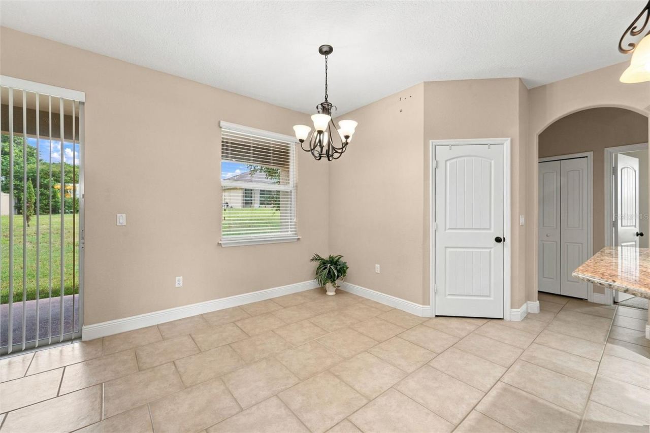 Photo 8 of 20: Kitchen opening to breakfast nook.