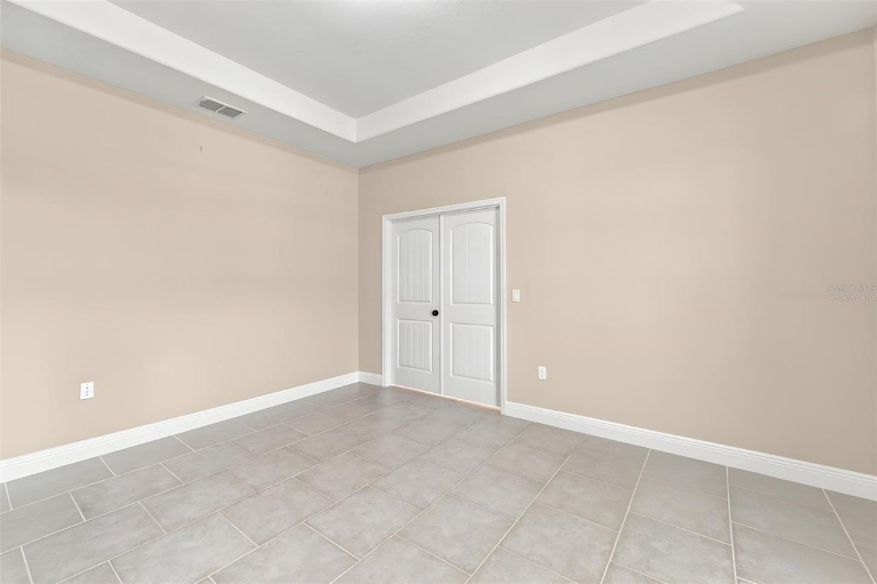 Photo 16 of 20: Virtually altered bonus room works well as office, storage, or play room.