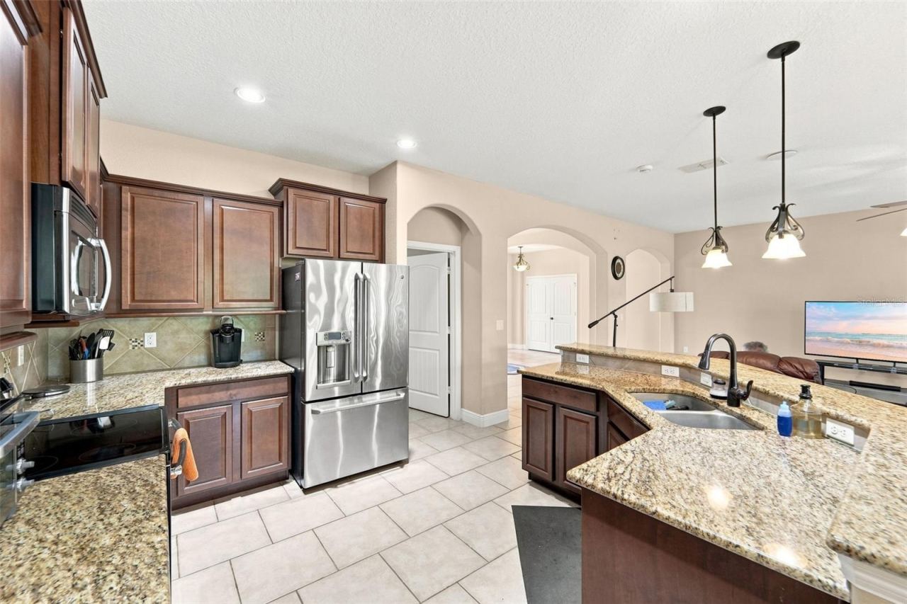 Photo 2 of 20: Kitchen with granite countertops & 36 inch upper cabinetry.