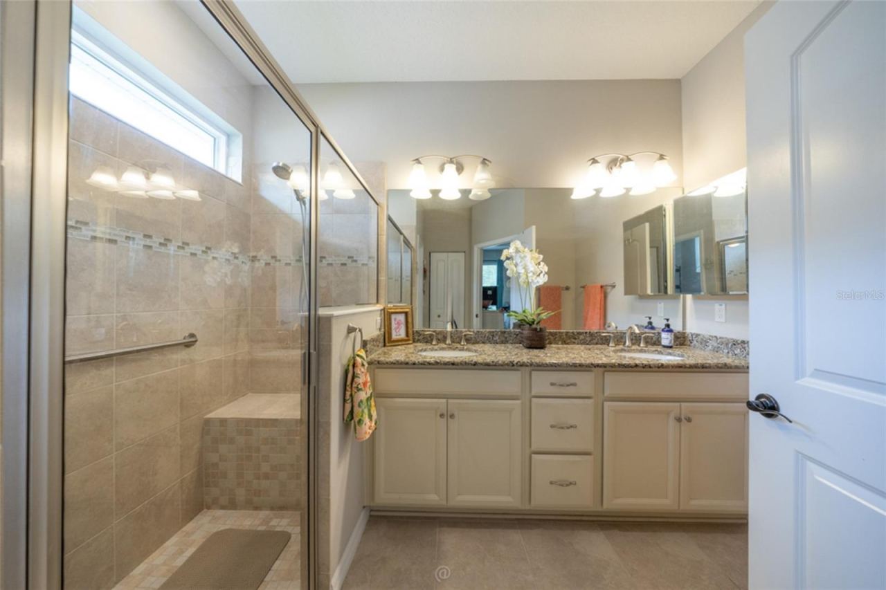 Photo 15 of 20: Primary bathroom with walk-in shower