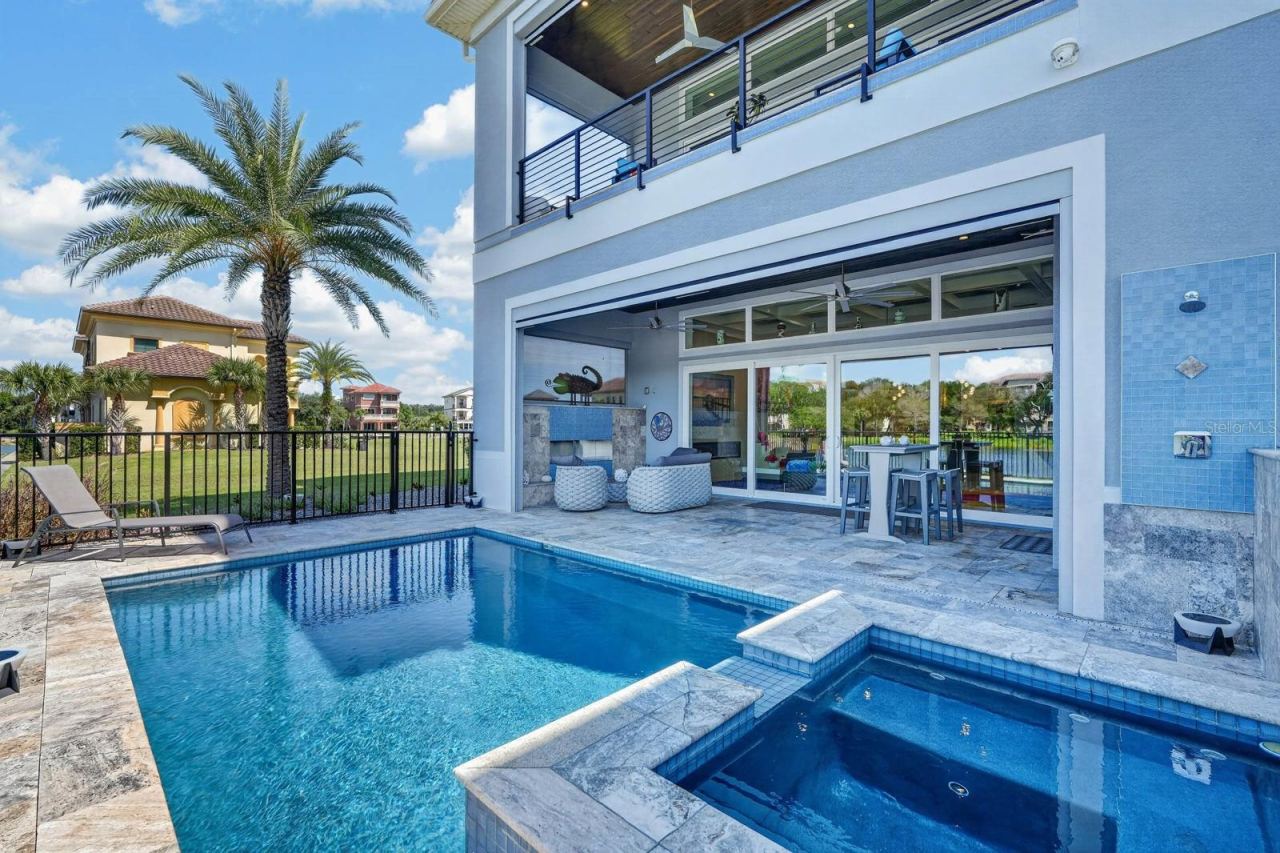 Photo 2 of 20: Direct Intracoastal living with a heated saltwater pool & spa, two waterfalls and premium pool equipment..all remotely operated.