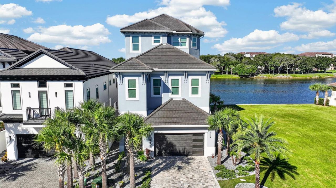 Photo 12 of 20: Three levels designed around the water. This 4,150 SF residence lives large, with expansive Intracoastal views and outdoor living from every level.