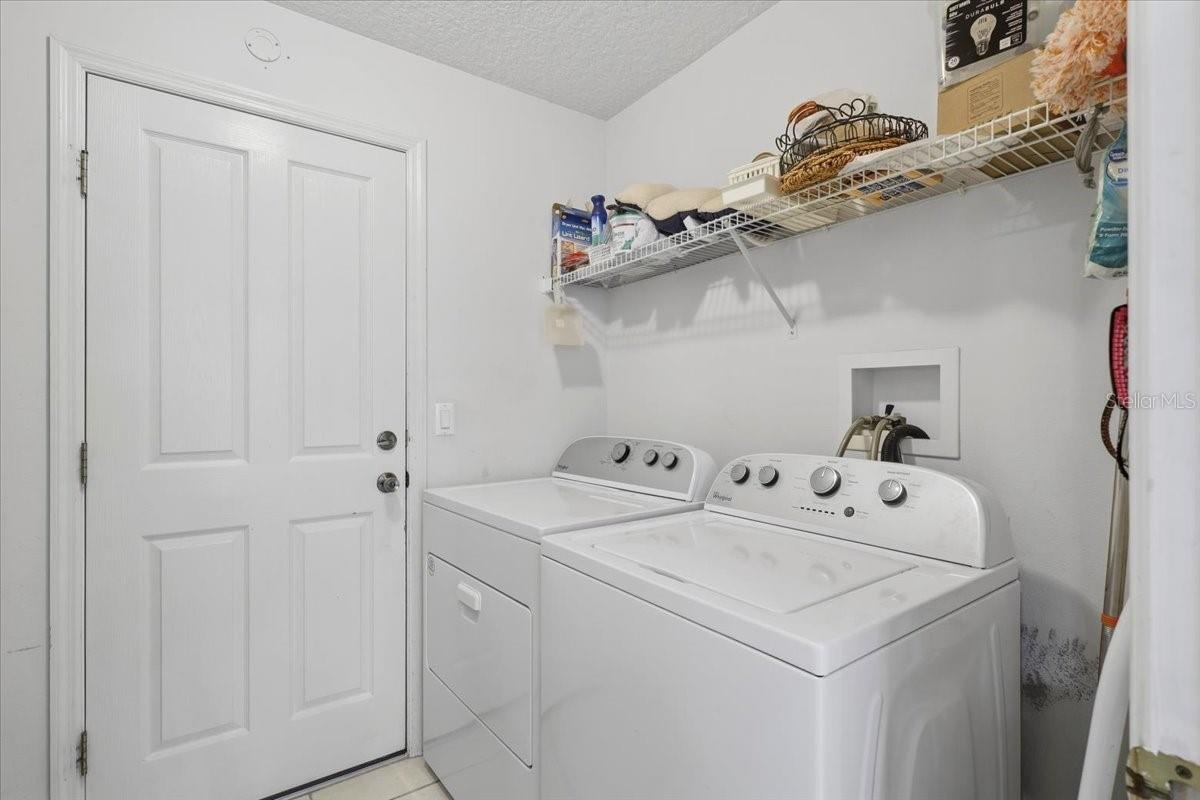 Photo 19 of 20: Laundry room with Sink and Storage