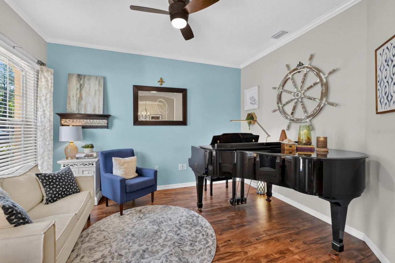 Photo 10 of 20: Den, office or living room with crown molding
