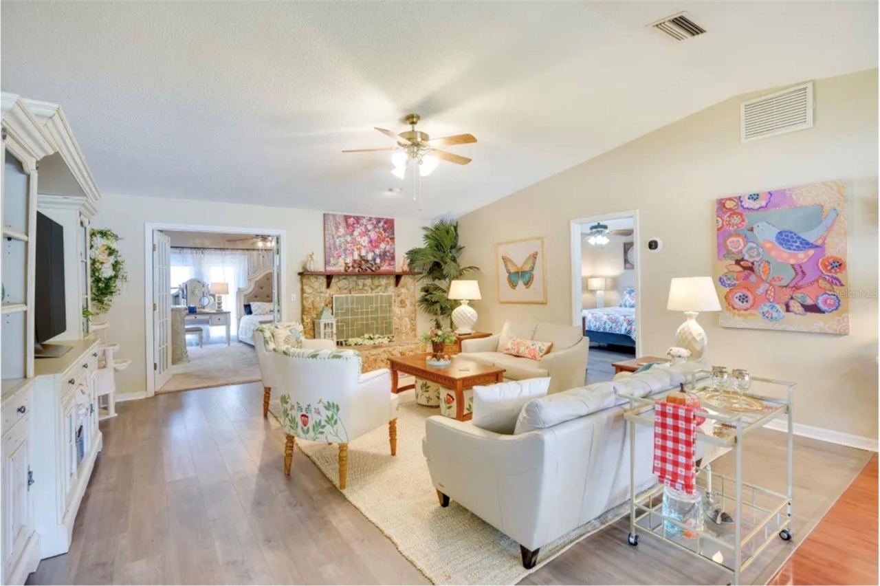 Photo 6 of 20: Living room & MBR have newer Luxury vinyl plank flooring.