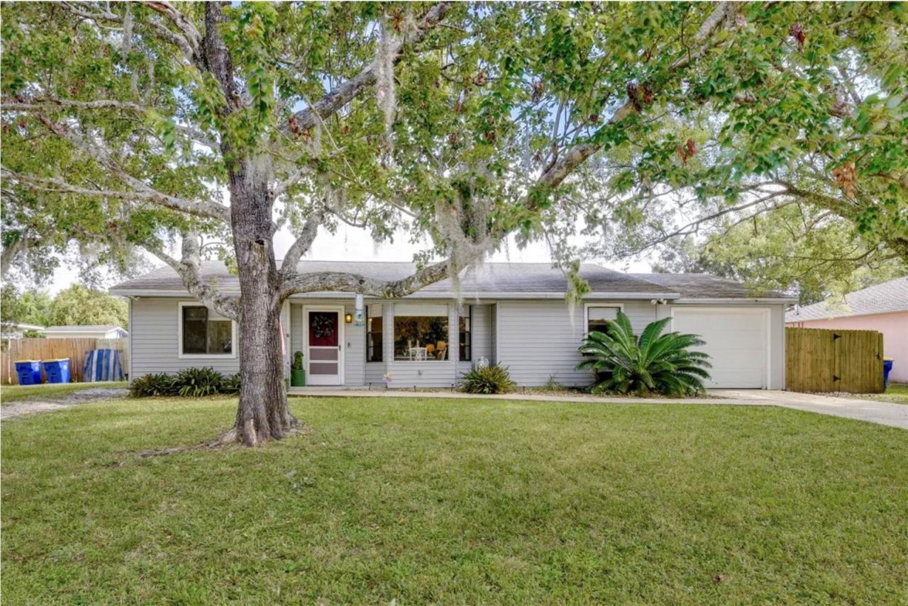 Photo 1 of 20: Charming 4BR/3BA/1 GAR on tree shaded lot!