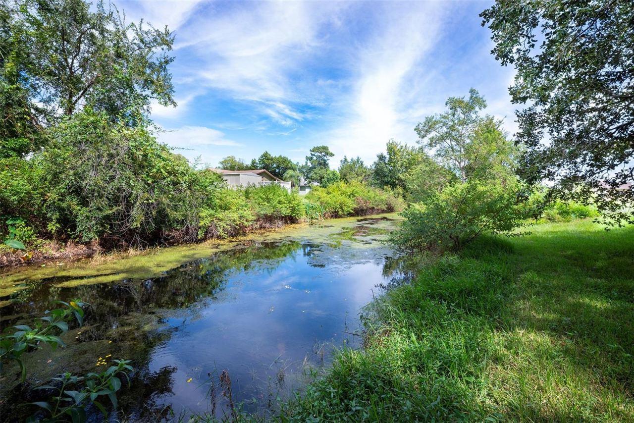 Photo 7 of 20: Canal behind the home