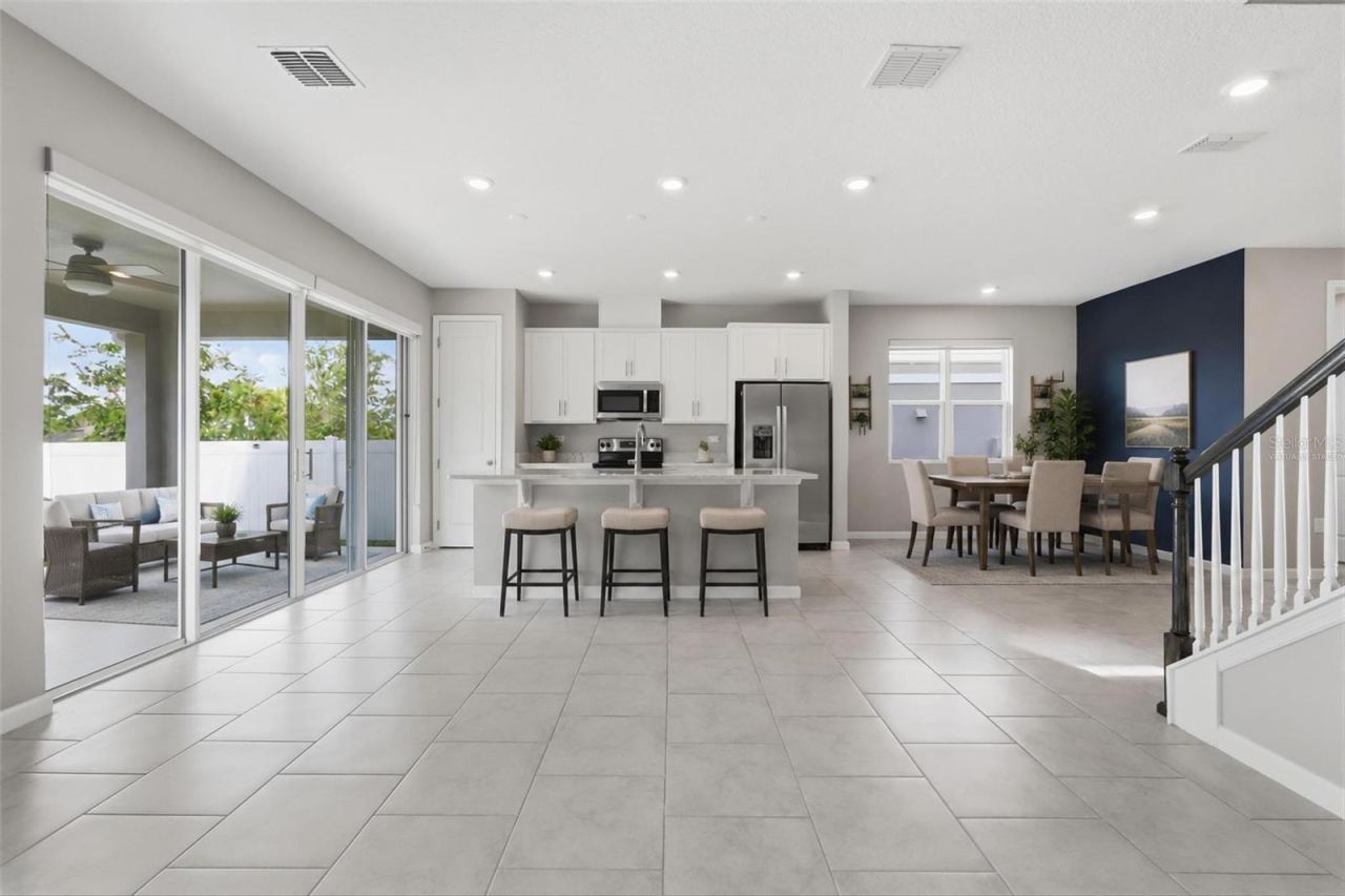 Photo 12 of 20: Virtually staged Kitchen and Dining Room