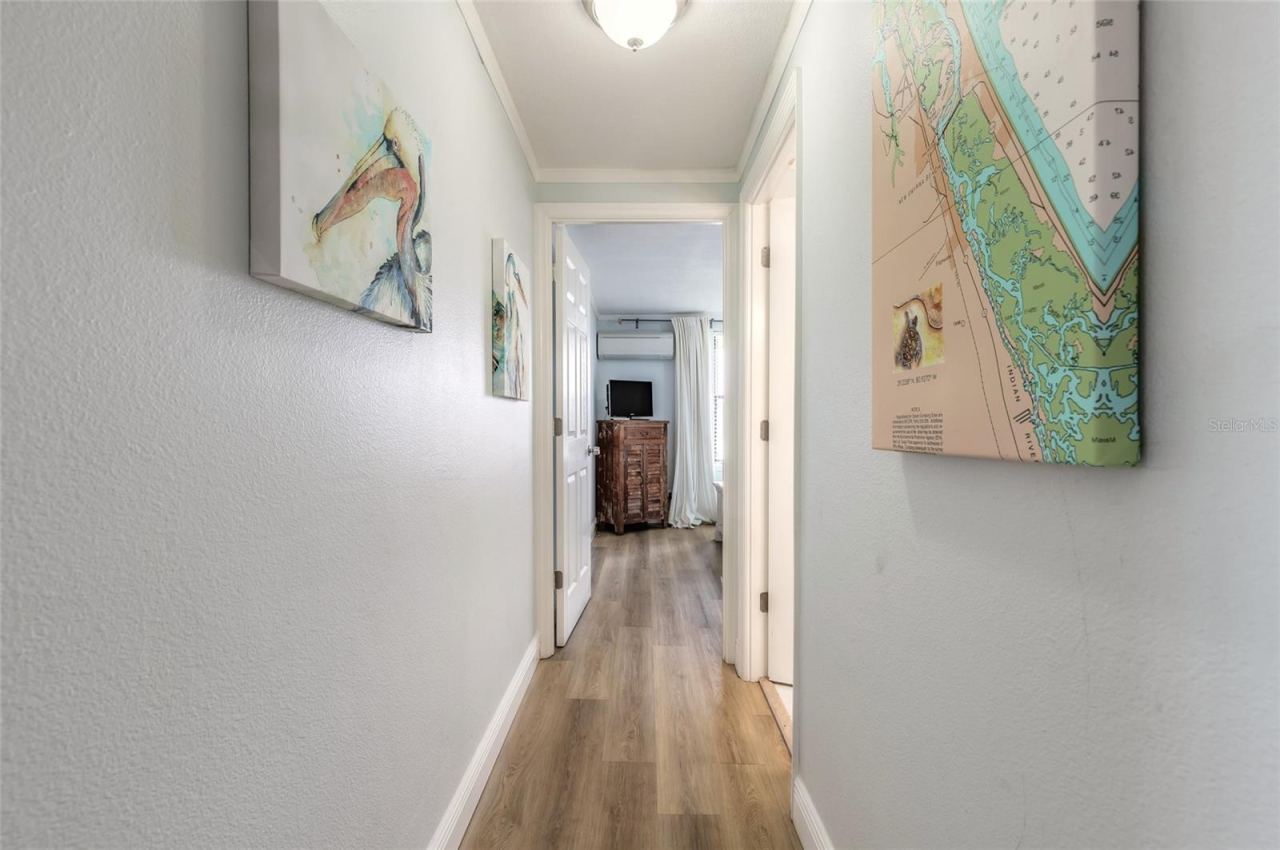 Photo 20 of 20: hallway to laundry room, guest bedroom Guest Bath