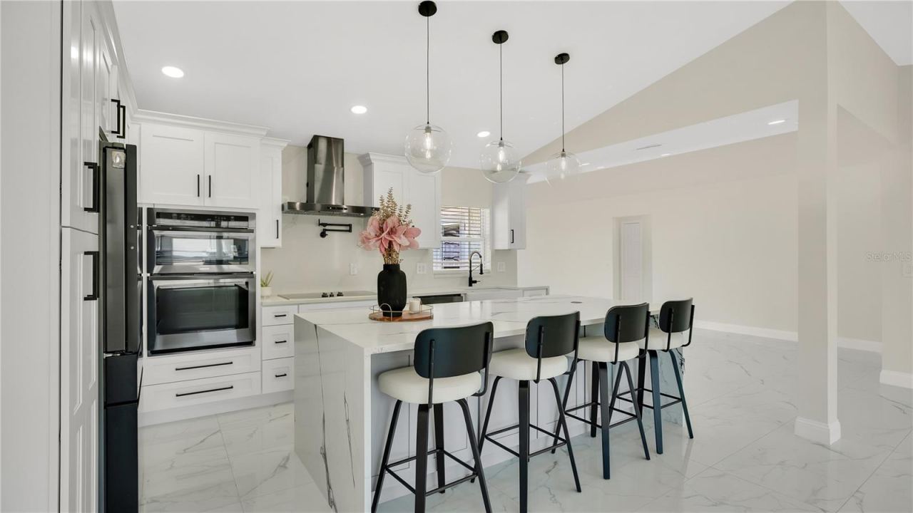 Photo 13 of 20: Kitchen with built-in oven and range hood