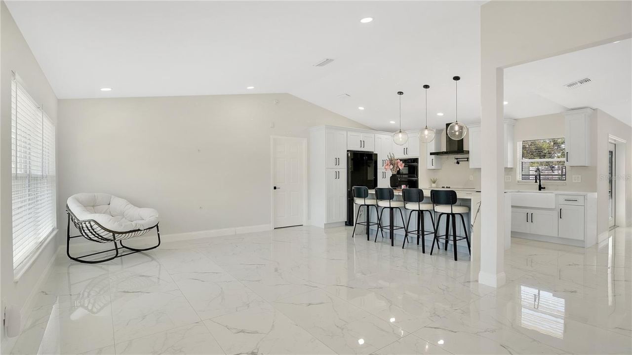 Photo 8 of 20: Living and dining area open to the kitchen