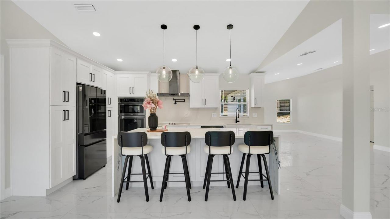Photo 12 of 20: Kitchen island and bar seating