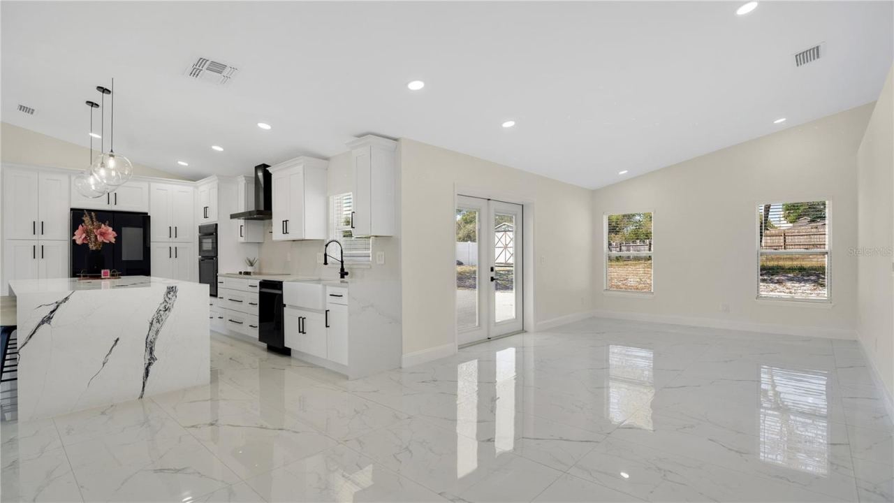 Photo 7 of 20: Open living area with vaulted ceilings