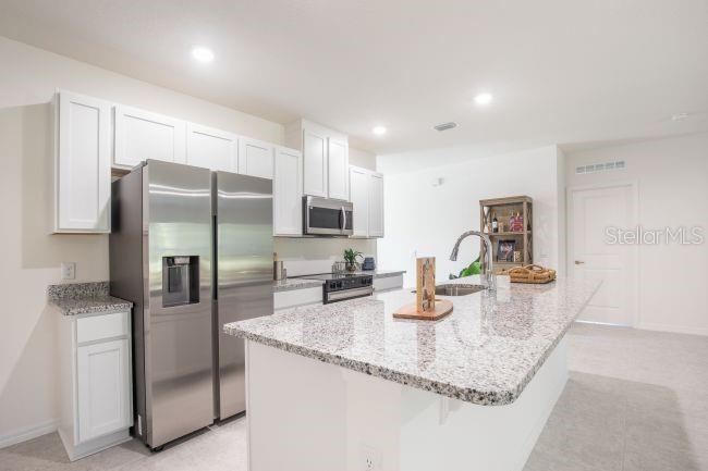 Photo 4 of 20: Model home - actual features may vary.