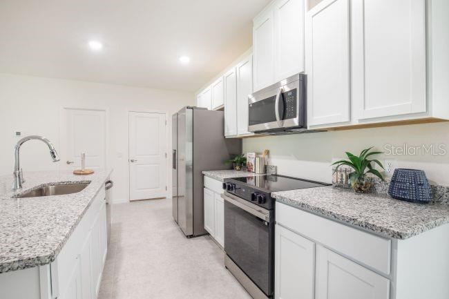 Photo 6 of 20: Model home - actual features may vary.