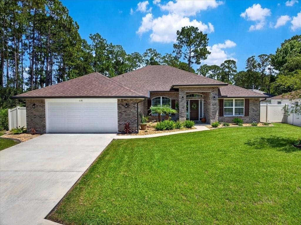 Photo 1 of 20: Welcome to 118 Ryberry Dr Palm Coast, Fl ! 4/3/2 fully fenced backyard, No HOA nor CDD.