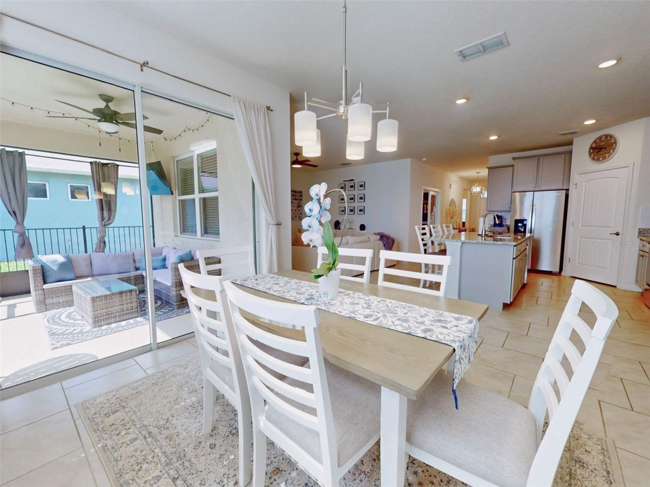 Photo 17 of 20: DINING AREA FLOWS TO SCREENED BACK PATIO