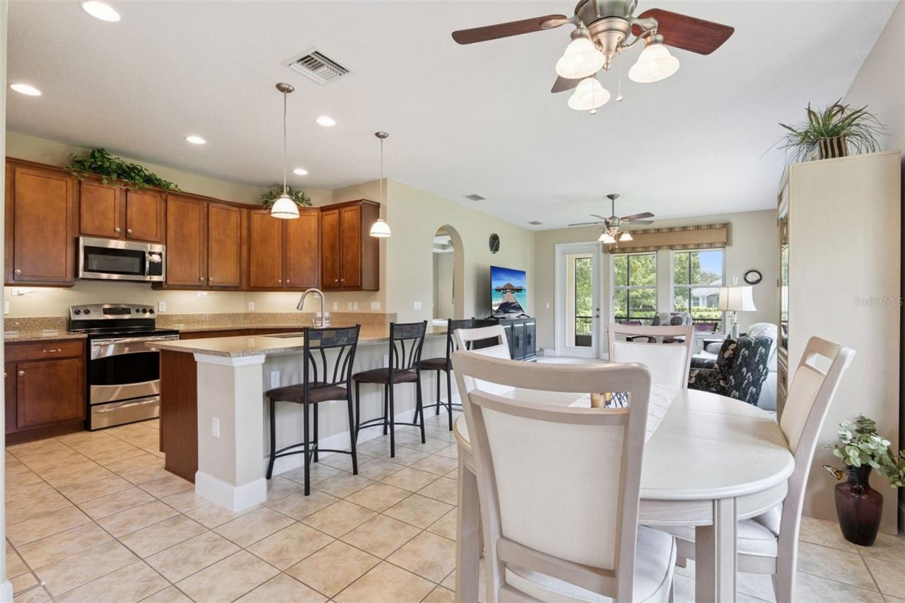 Photo 5 of 20: View of the Dining & Kitchen areas w/ a breakfast bar