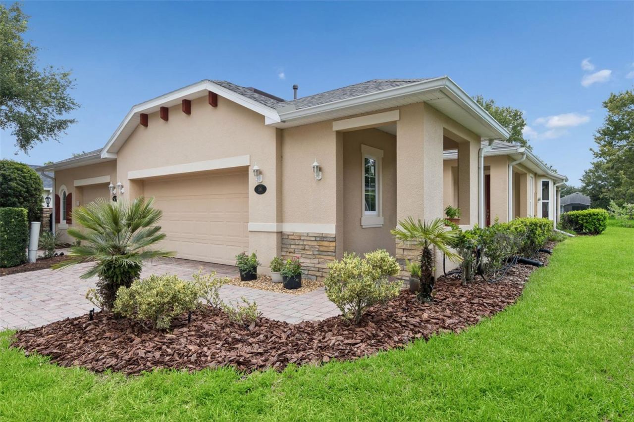 Photo 2 of 20: Exterior front of the Villa w/ an oversized 2-car garage