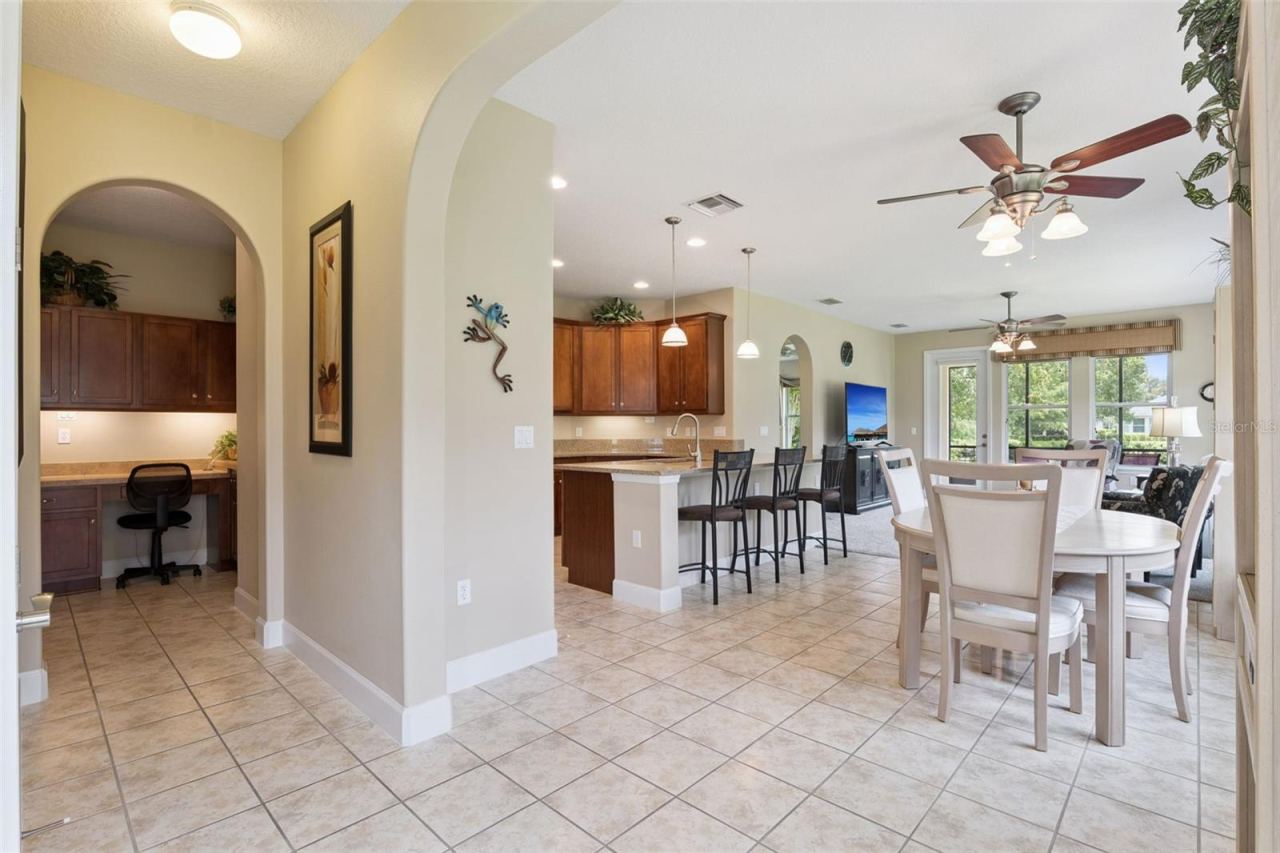 Photo 4 of 20: View of Dining & Great Room from Foyer entryway