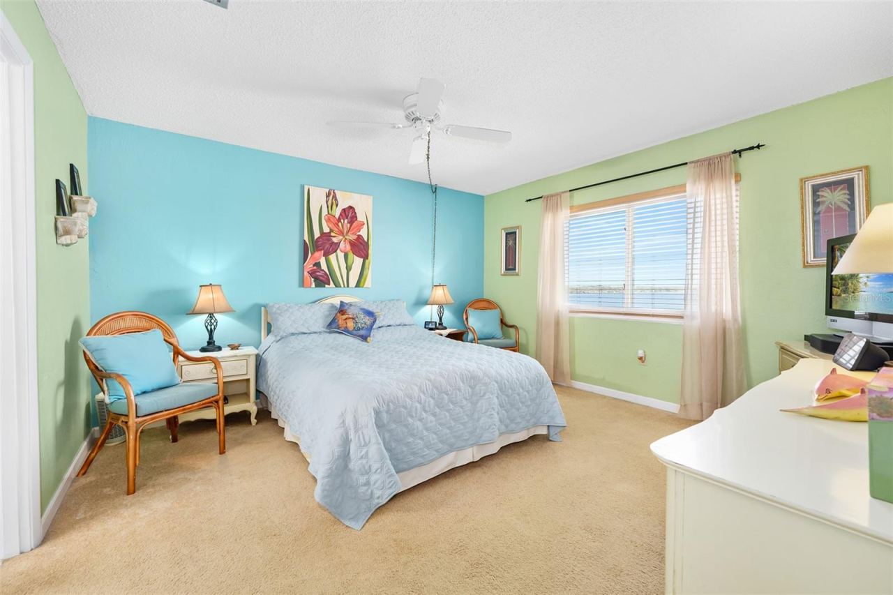 Photo 15 of 20: Coastal colors in primary bedroom