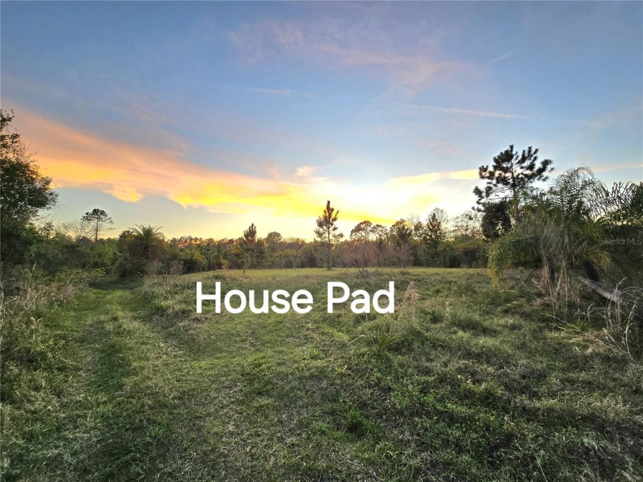 Photo 3 of 9: Build your dream home. Pad in place. The dirt is worth over 54000.!