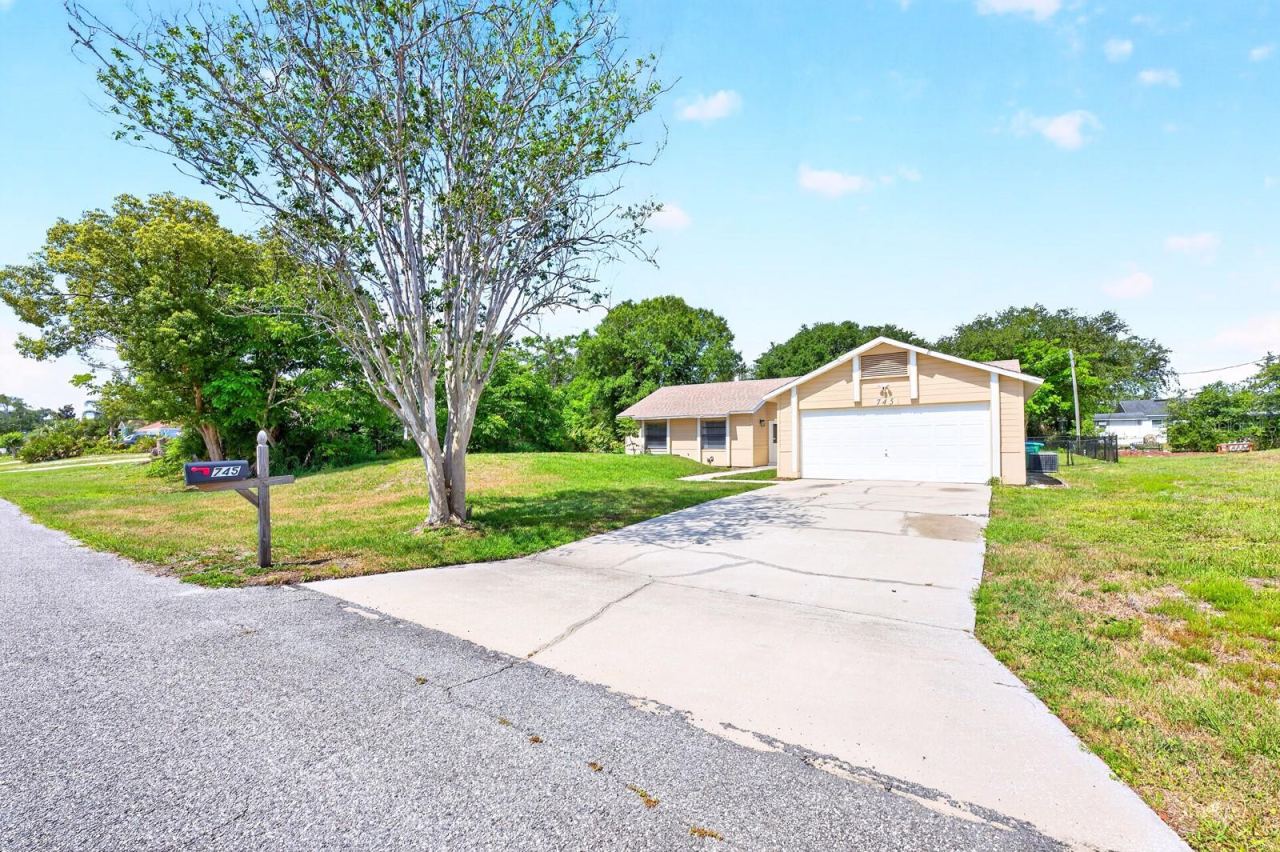 Photo 2 of 20: Situated on an OVERSIZED LOT, this property offers plenty of room to spread out both inside and out.