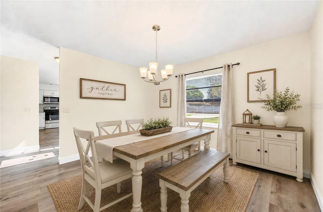 Photo 6 of 20: The home also features a separate Dining Room, ideal for entertaining or everyday meals. Virtually Staged